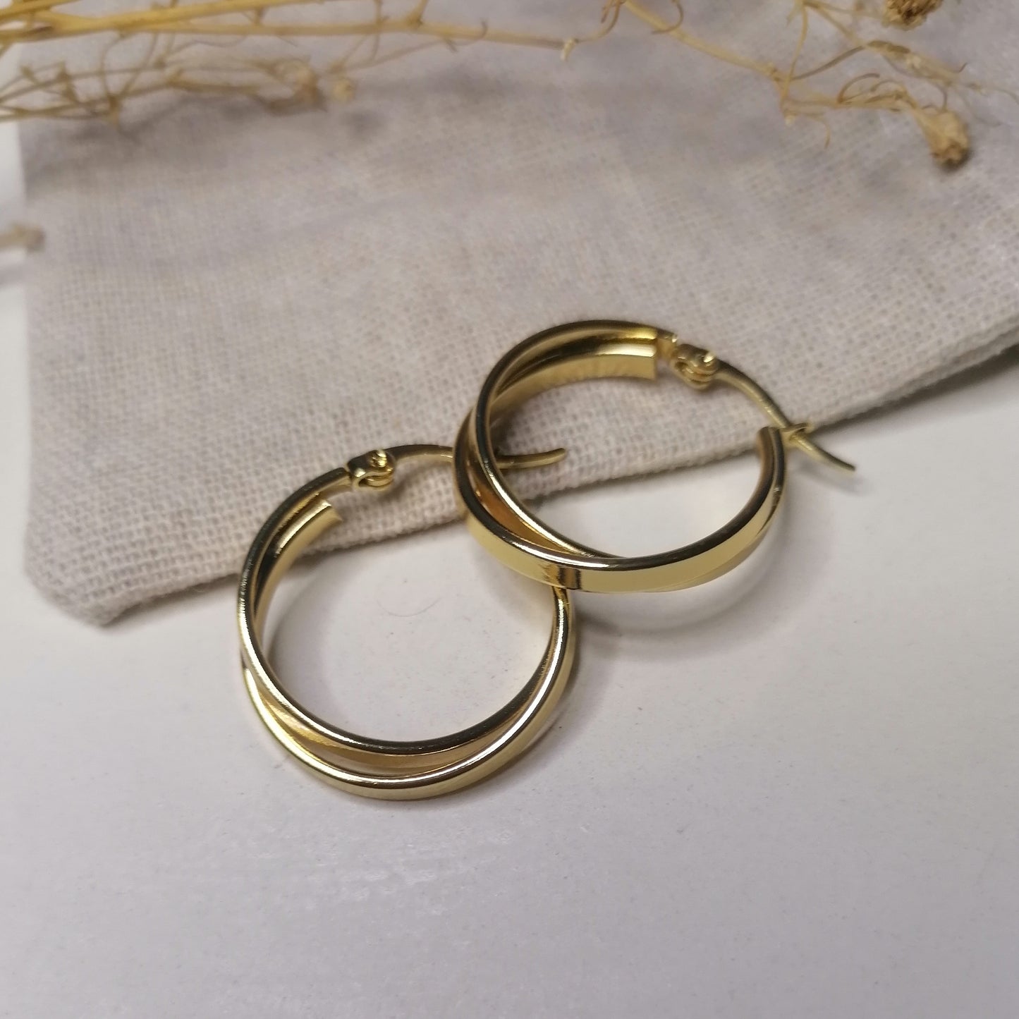 AD034 | Aros dobles en acero dorado