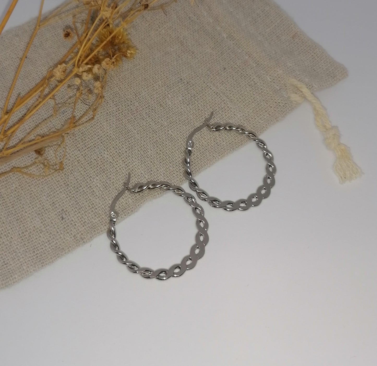 AQ008 | Aros en acero inoxidable trenzado chato
