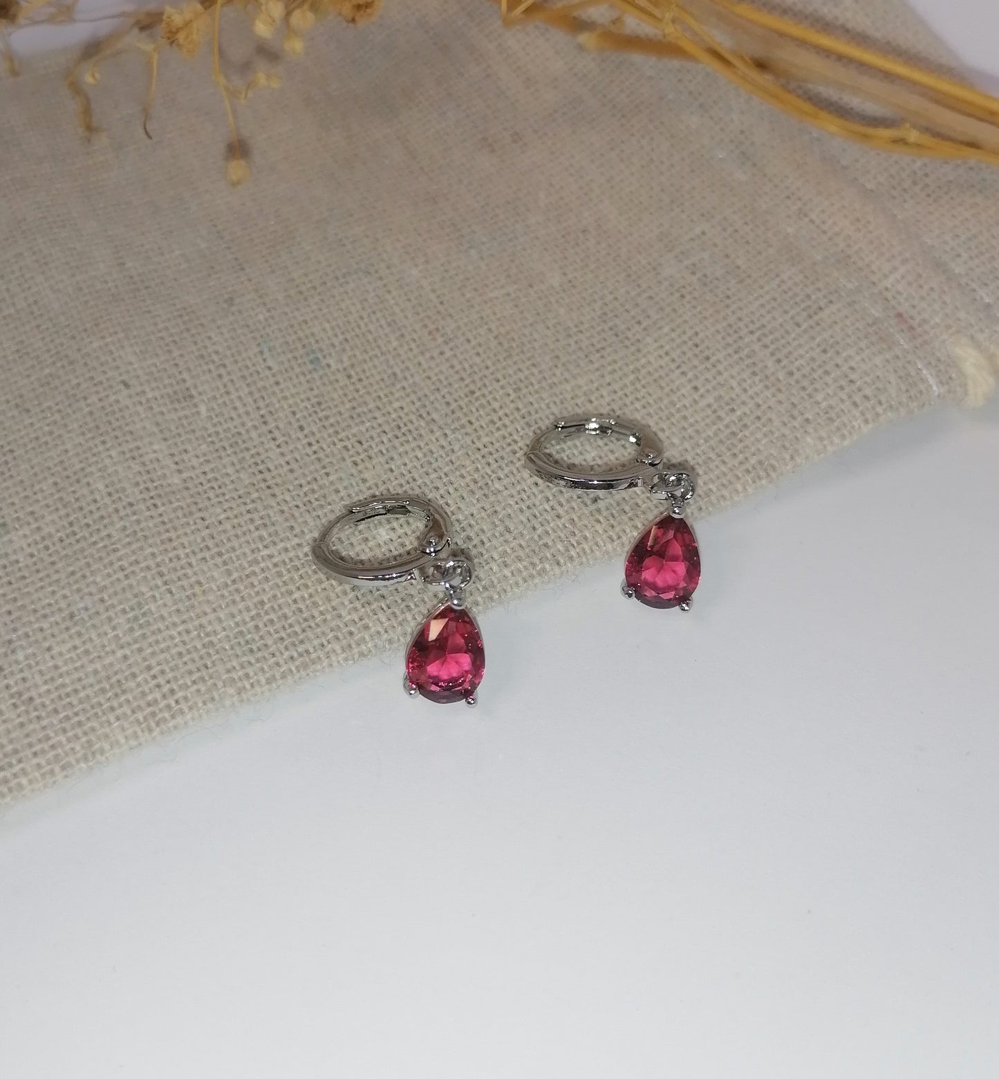 AQ028 | Aros gota en acero inoxidable con circonia