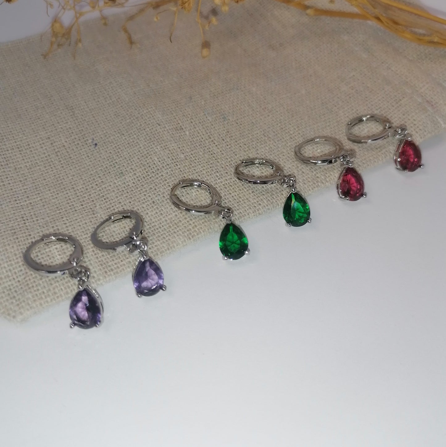 AQ028 | Aros gota en acero inoxidable con circonia