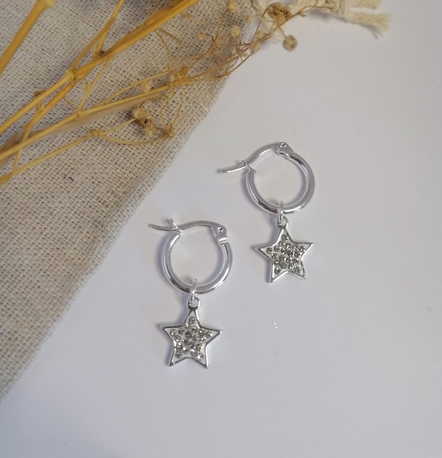 AQ031 | Aros estrella en acero blanco