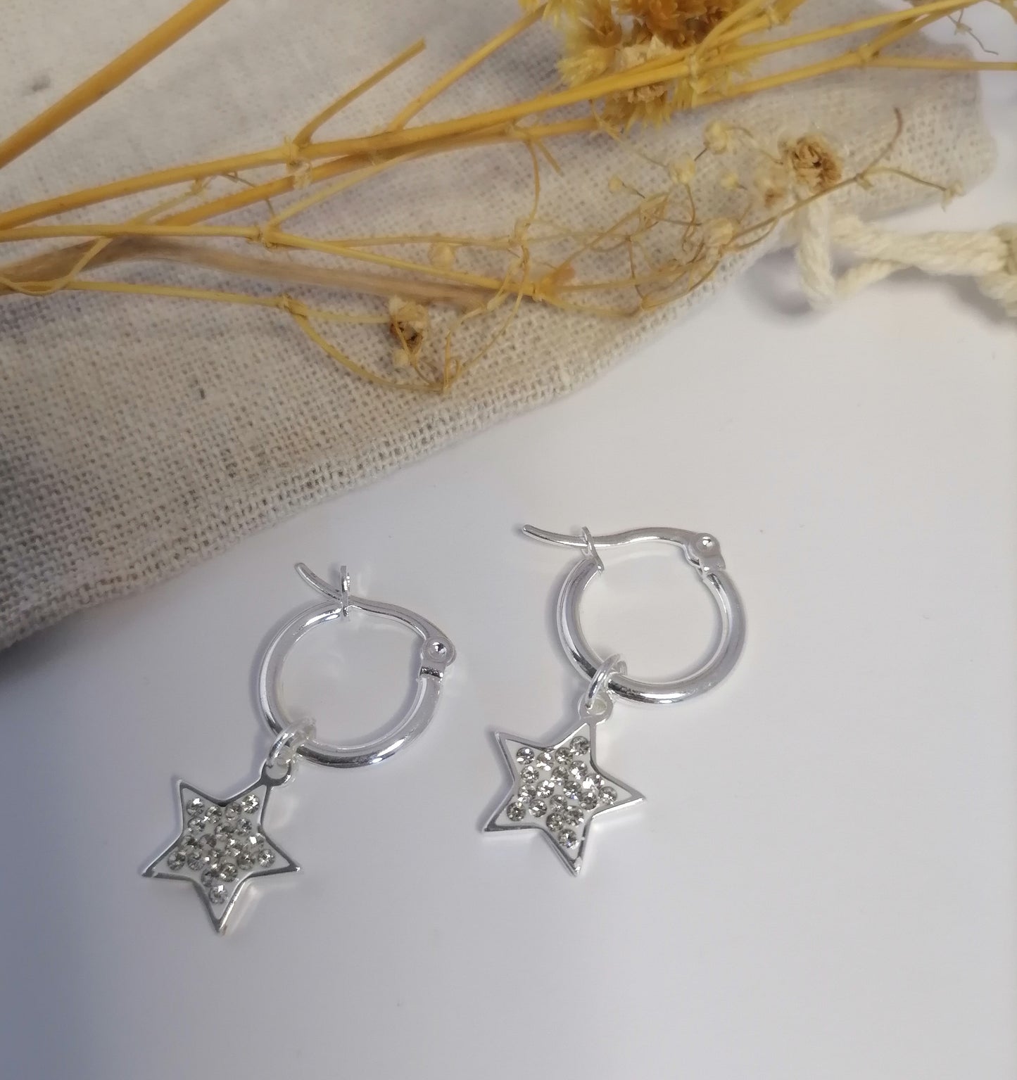 AQ031 | Aros estrella en acero blanco