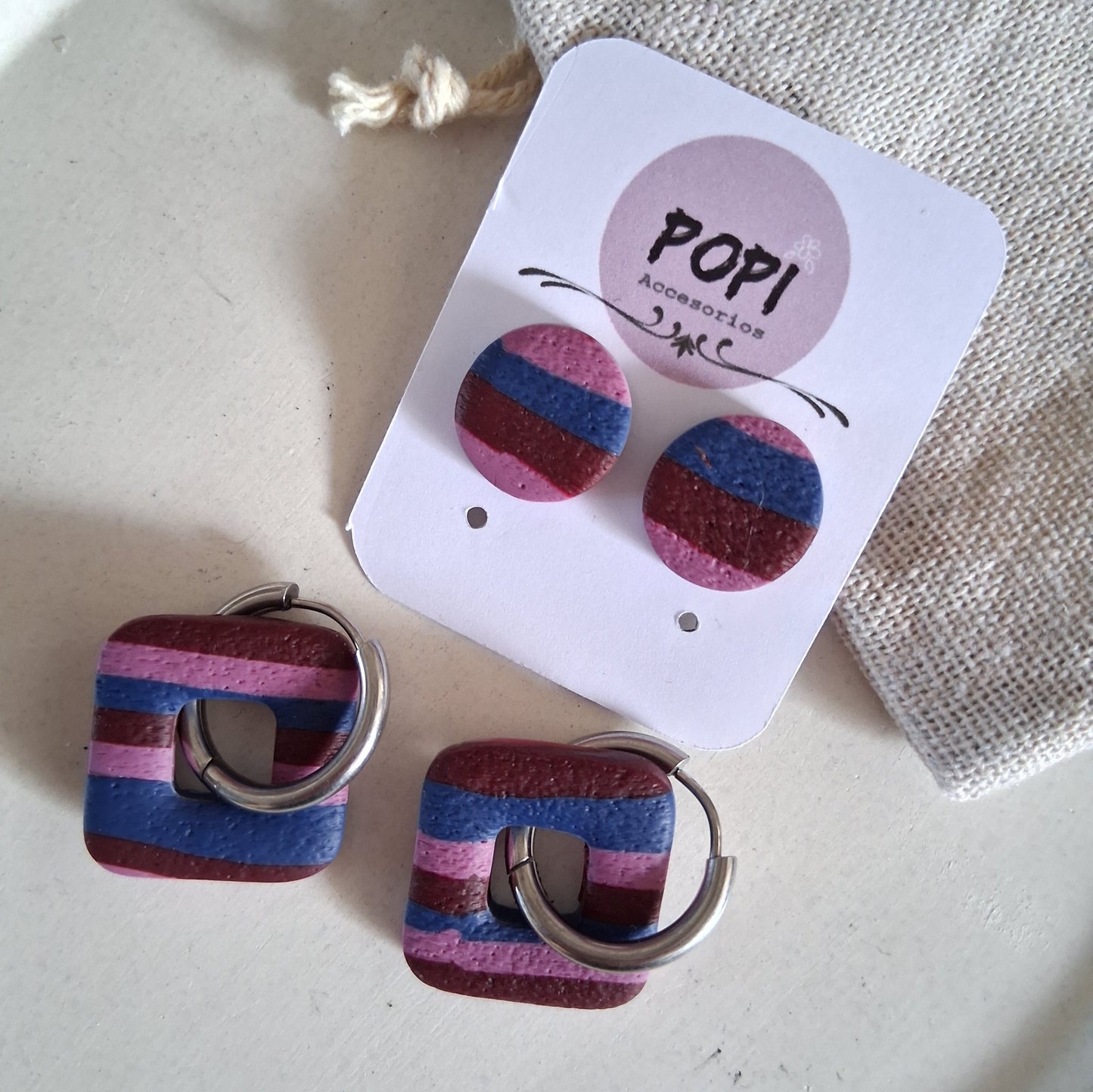 CL024 | Pack aros y caravanas Pachi - Rayas azul, rojo vino y malva