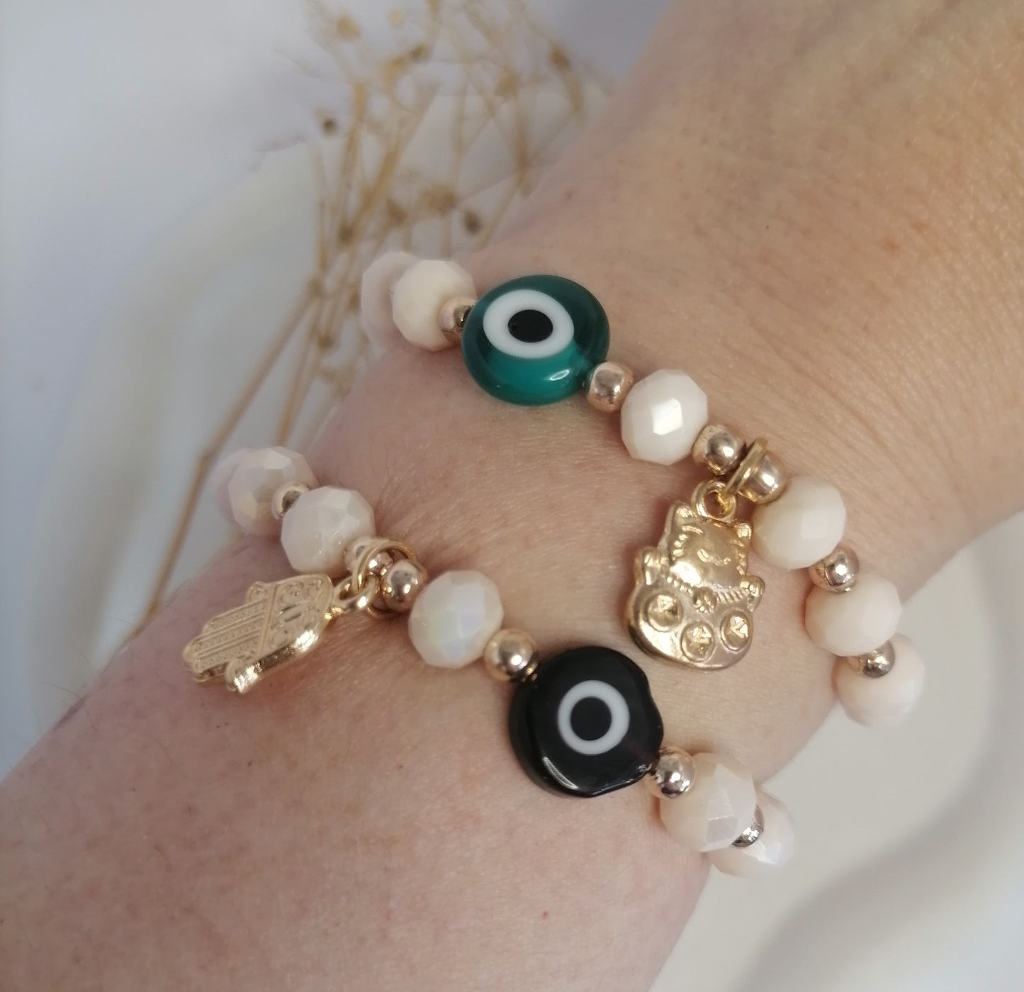 PD008 | Pulsera dorada amuleto mano de Fátima y ojo turco