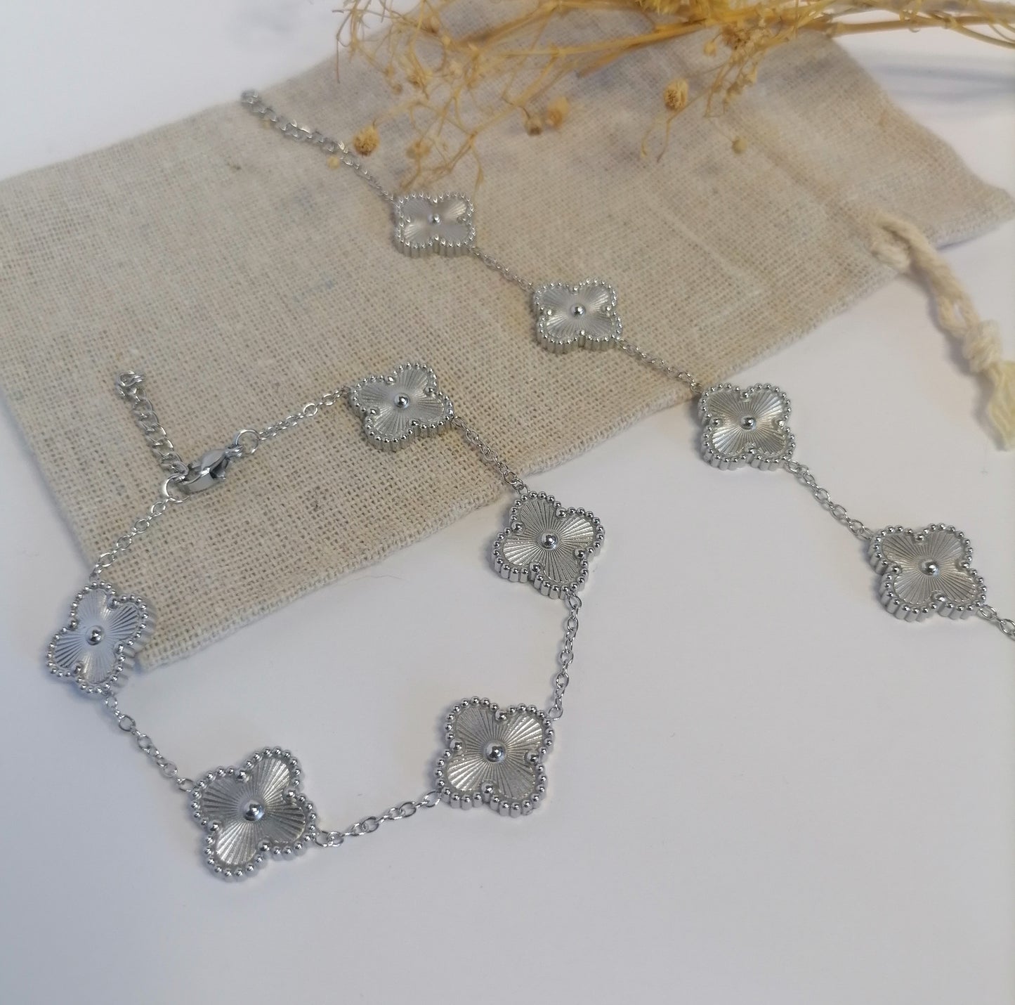 PQ006 | Pulsera en acero inoxidable tréboles de cuatro hojas