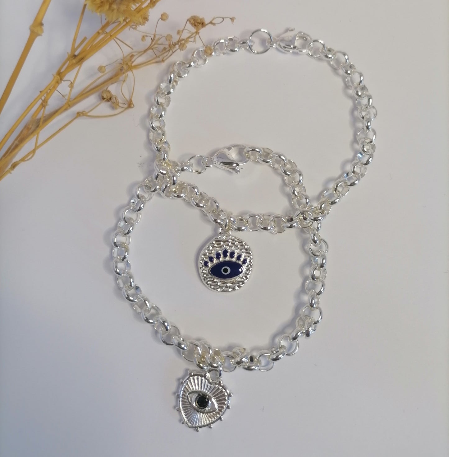 PQ007 | Pulsera rolo con dije en acero blanco