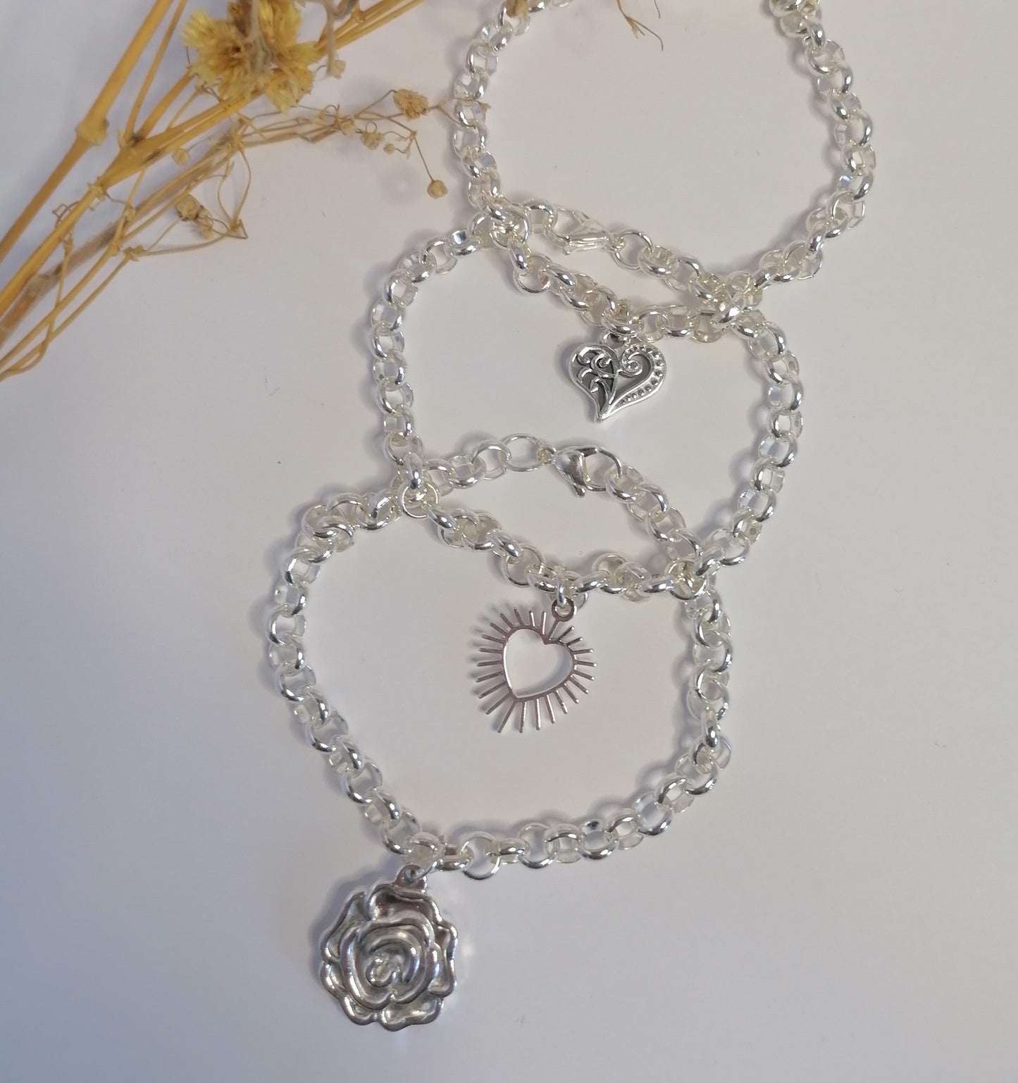 PQ007 | Pulsera rolo con dije en acero blanco