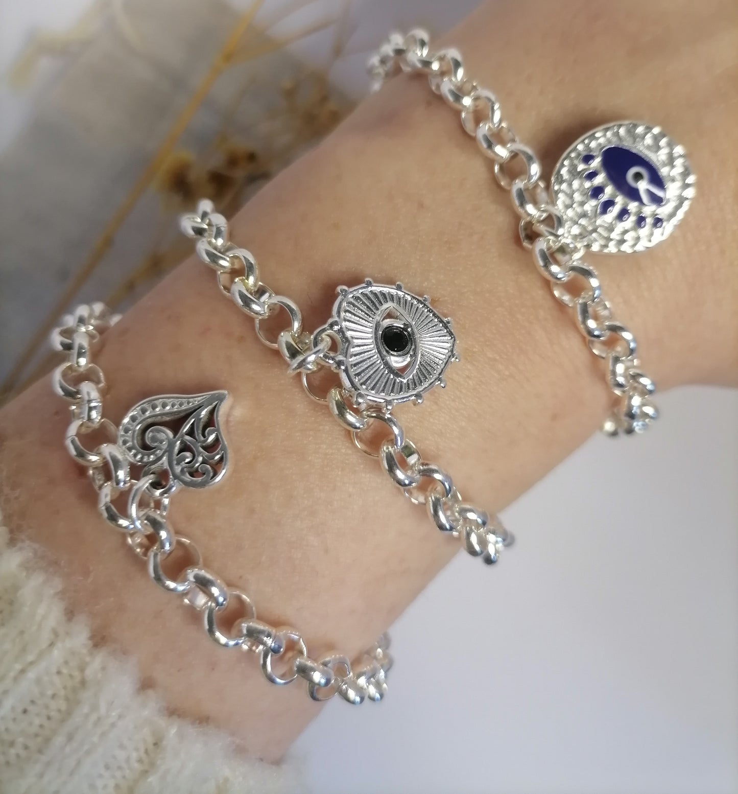 PQ007 | Pulsera rolo con dije en acero blanco