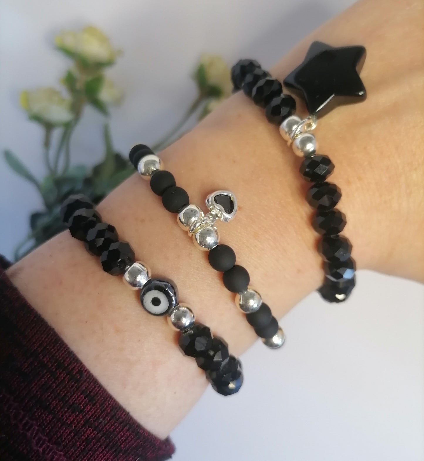 PQ013 | Pulsera cuentas negro brillante con dije ojo turco en acero blanco