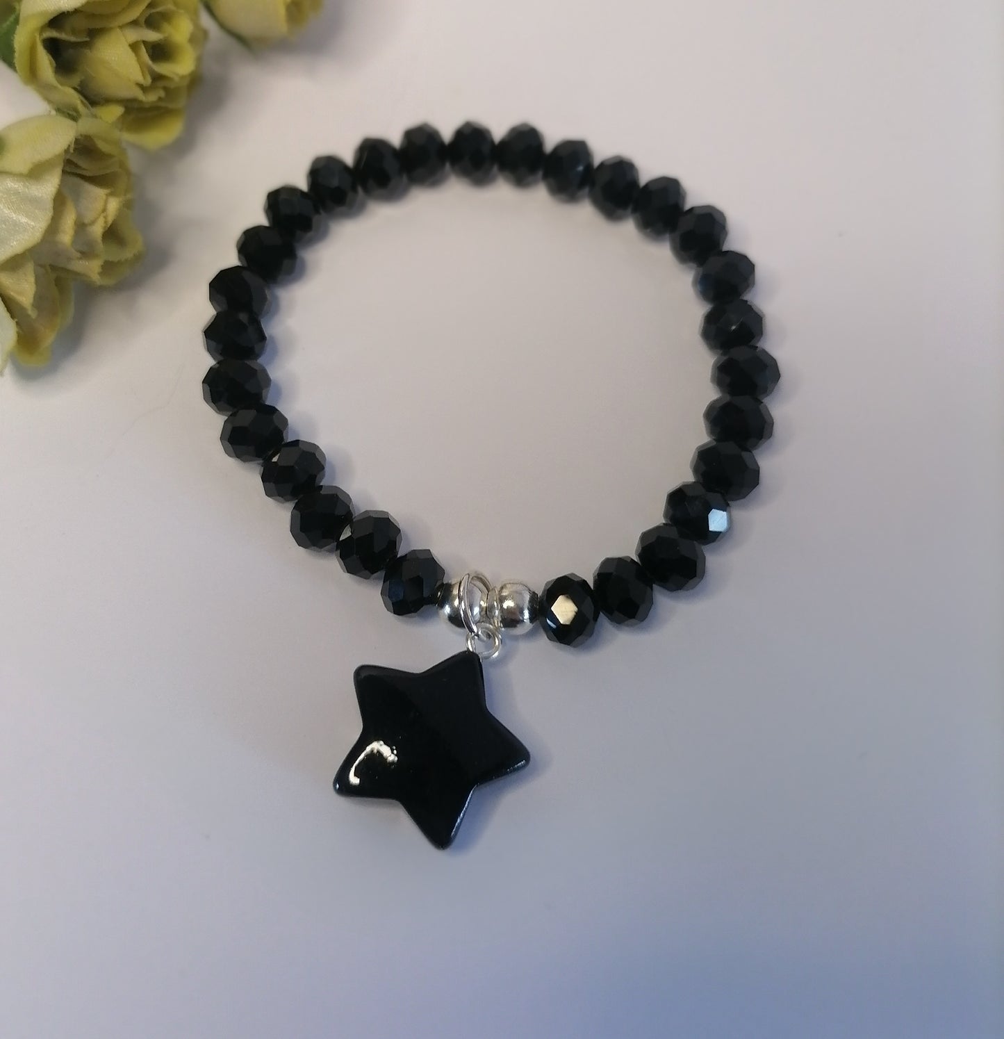 PQ012 | Pulsera cuentas negro brillante con dije estrella en acero blanco