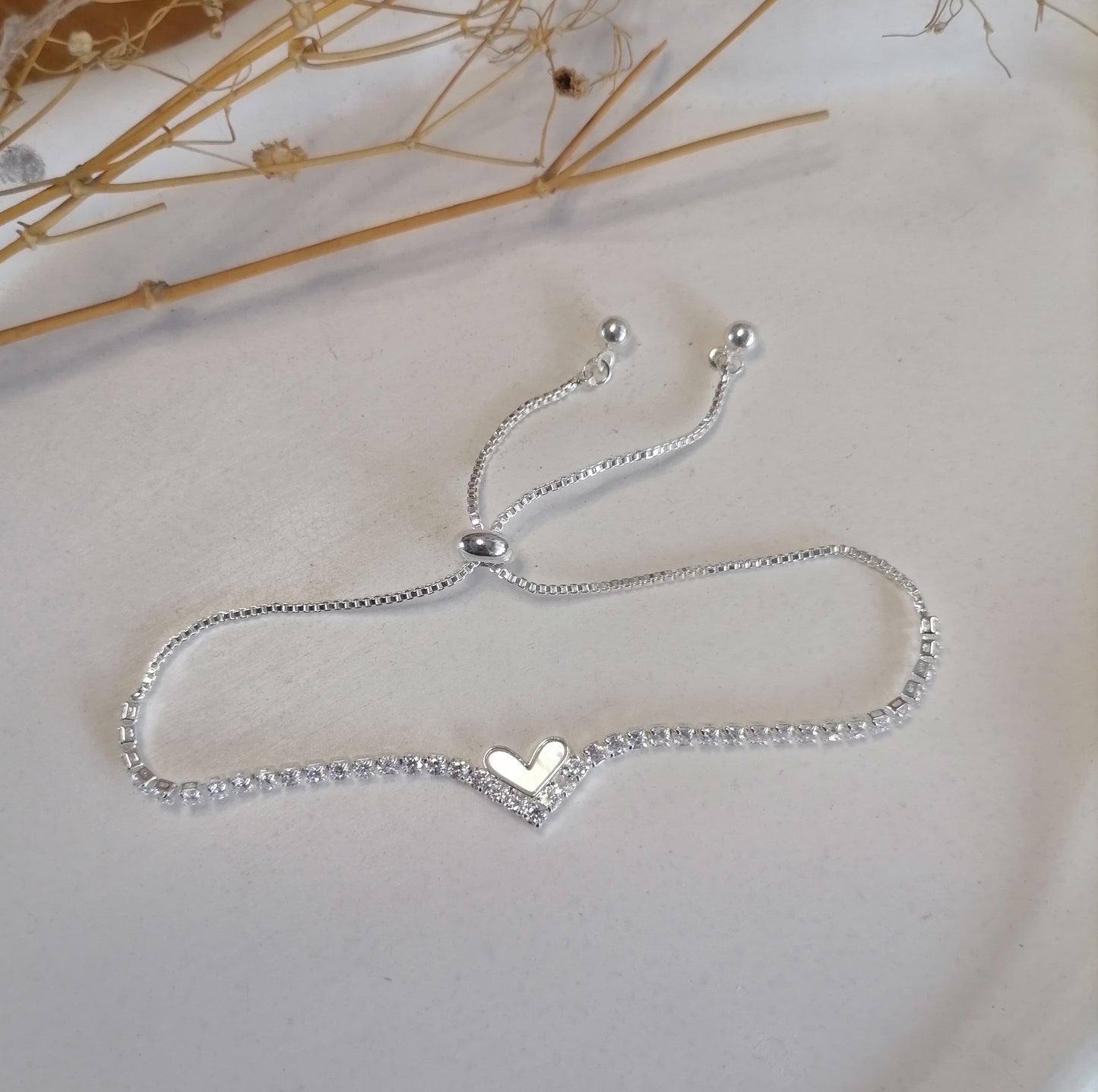 PQ039 | Pulsera ajustable en acero blanco corazón y circonias