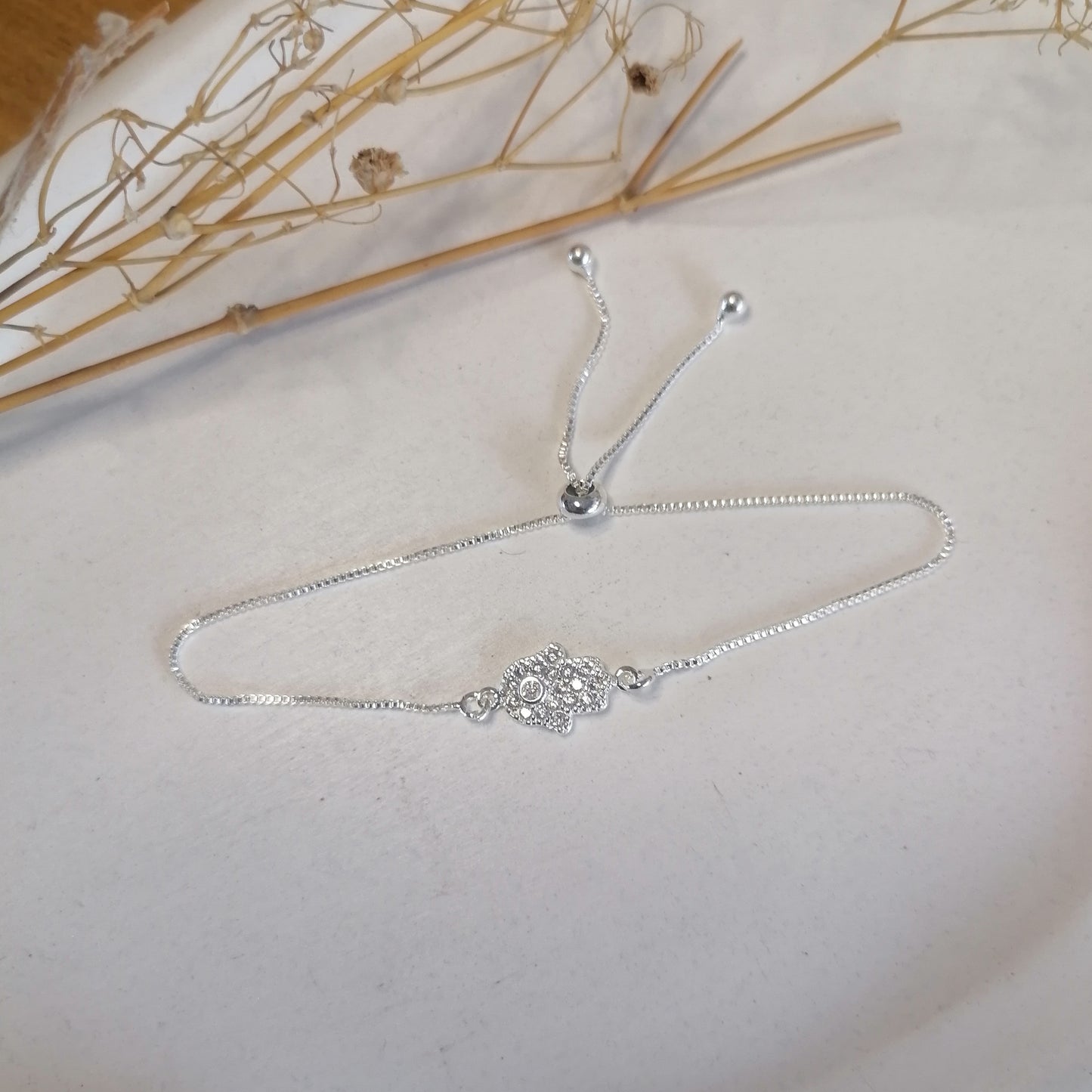 PQ043 | Pulsera ajustable en acero blanco mano de Fátima y circonias