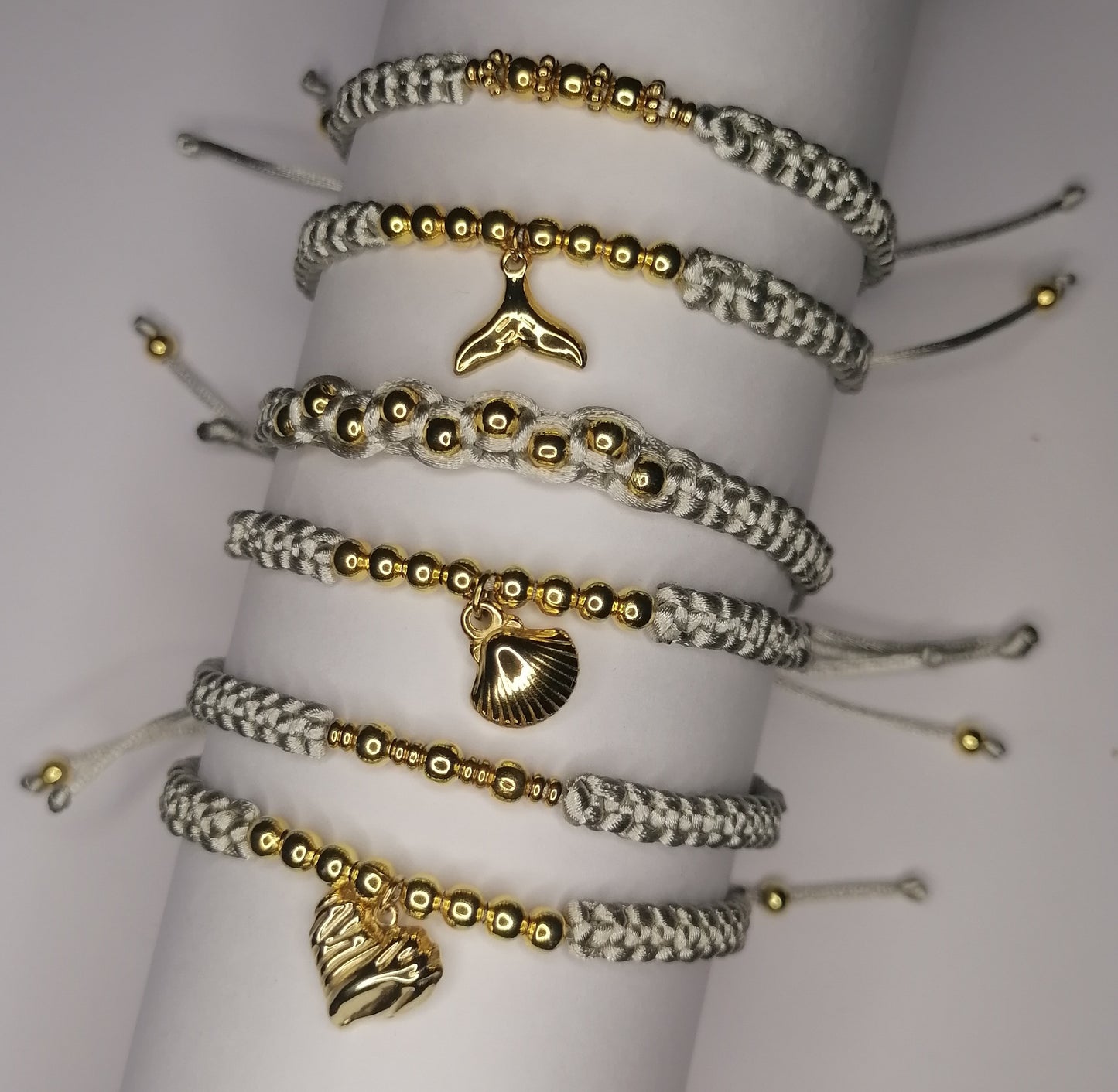 PT005 | Pulsera tejida regulable con separadores en acero dorado