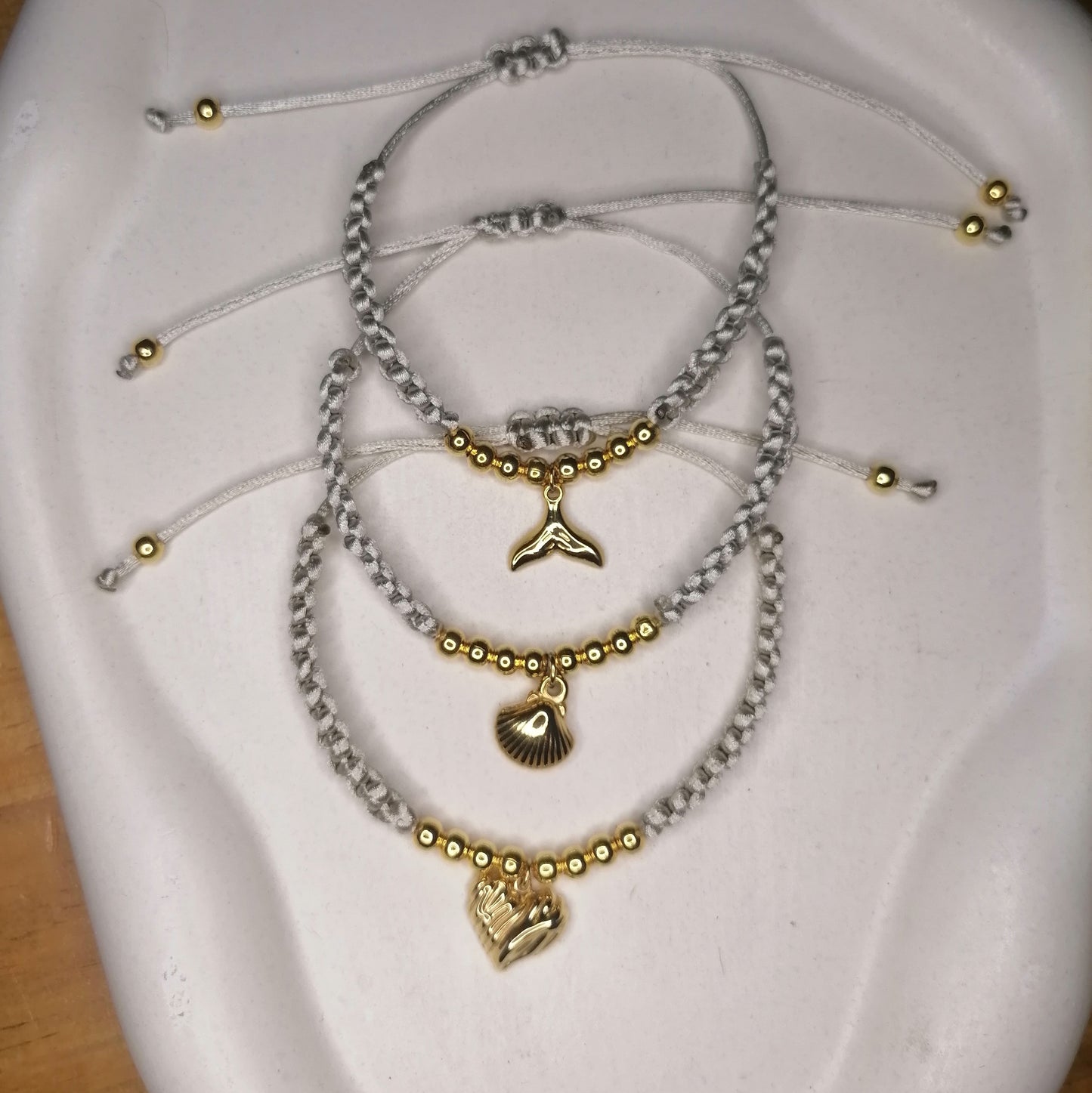 PT005 | Pulsera tejida regulable con separadores en acero dorado