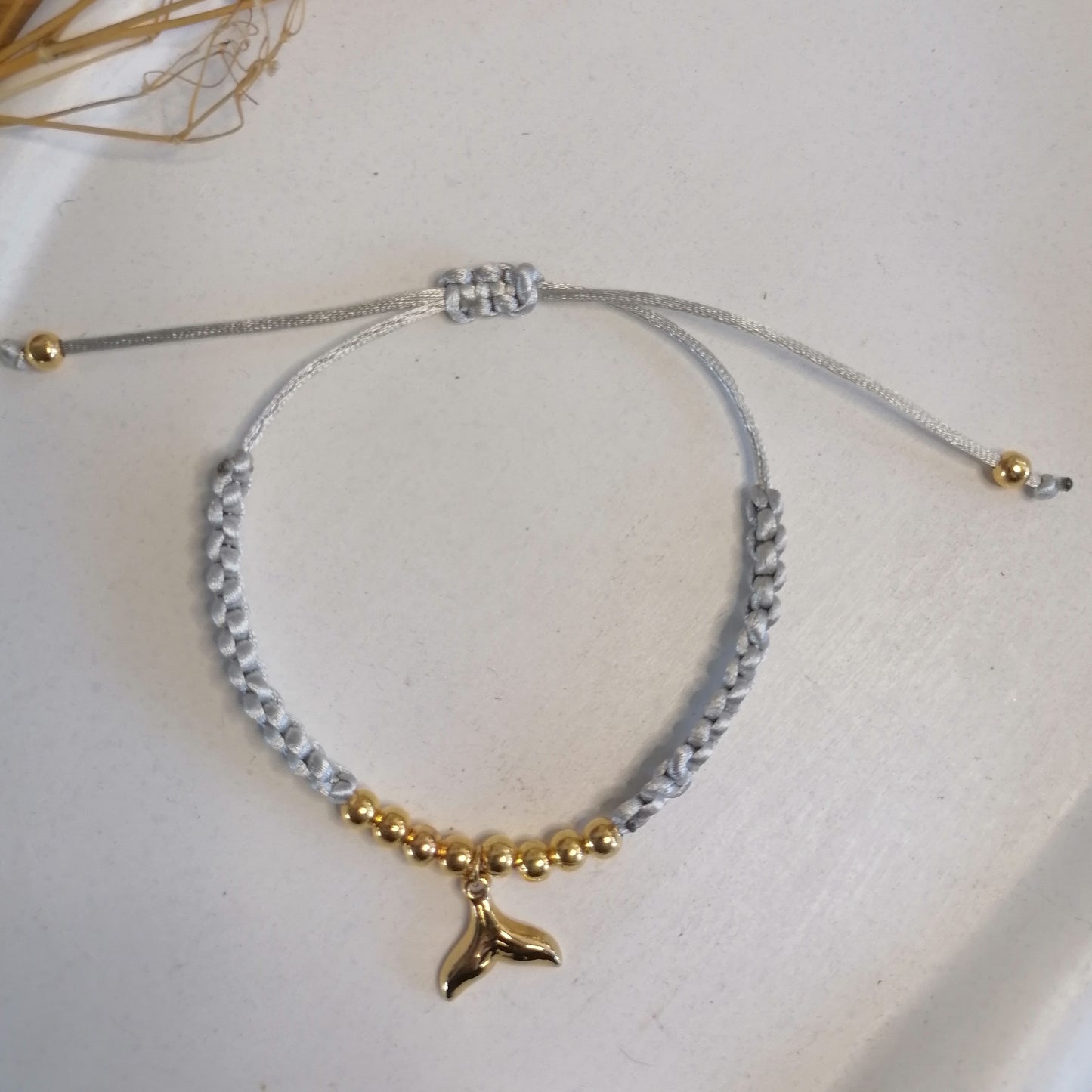 PT005 | Pulsera tejida regulable con separadores en acero dorado