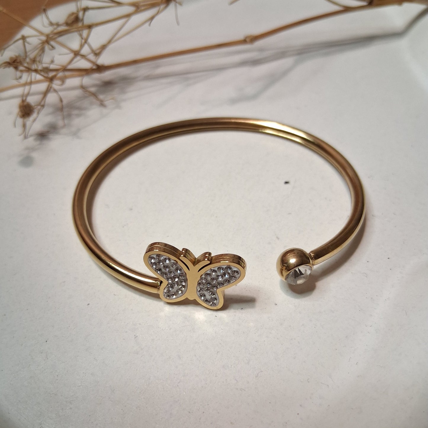 PD039 | Esclava en acero dorado mariposa y strass