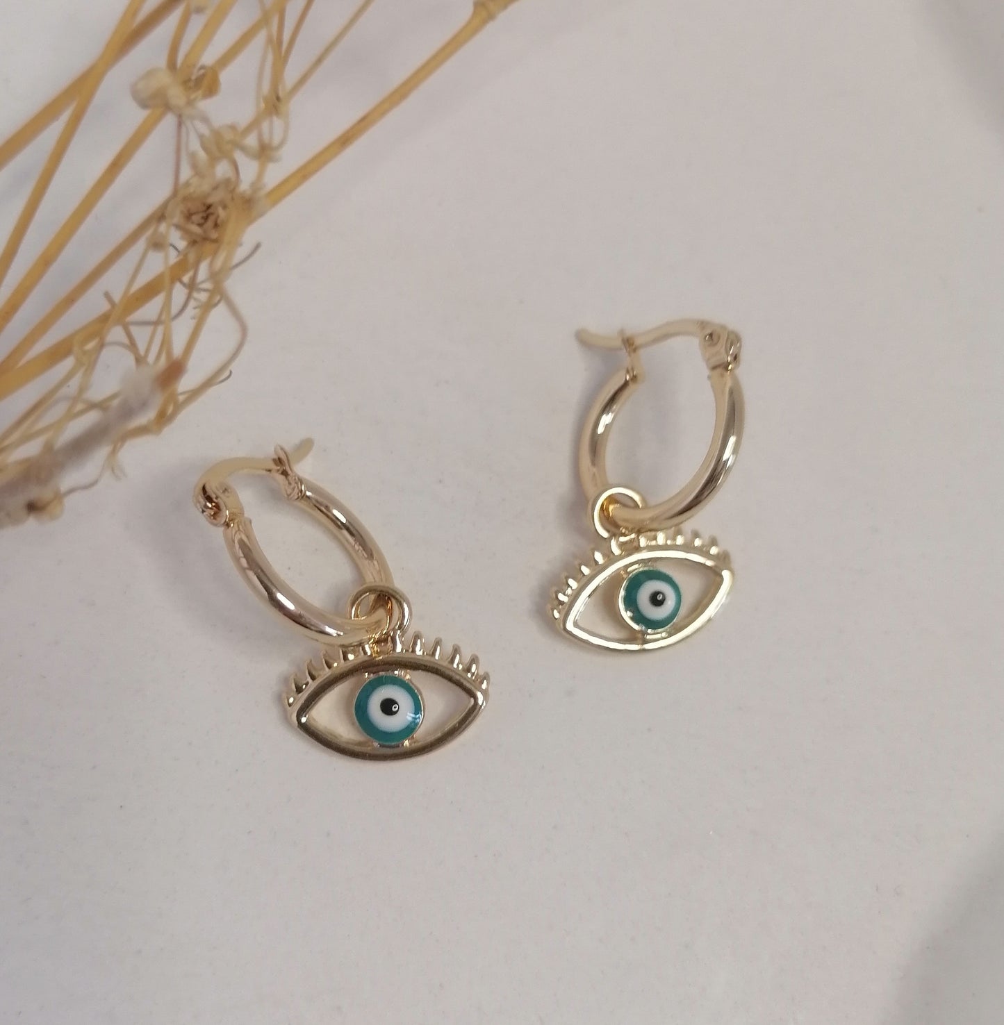 AD025 | Aros acero dorado ojo protector