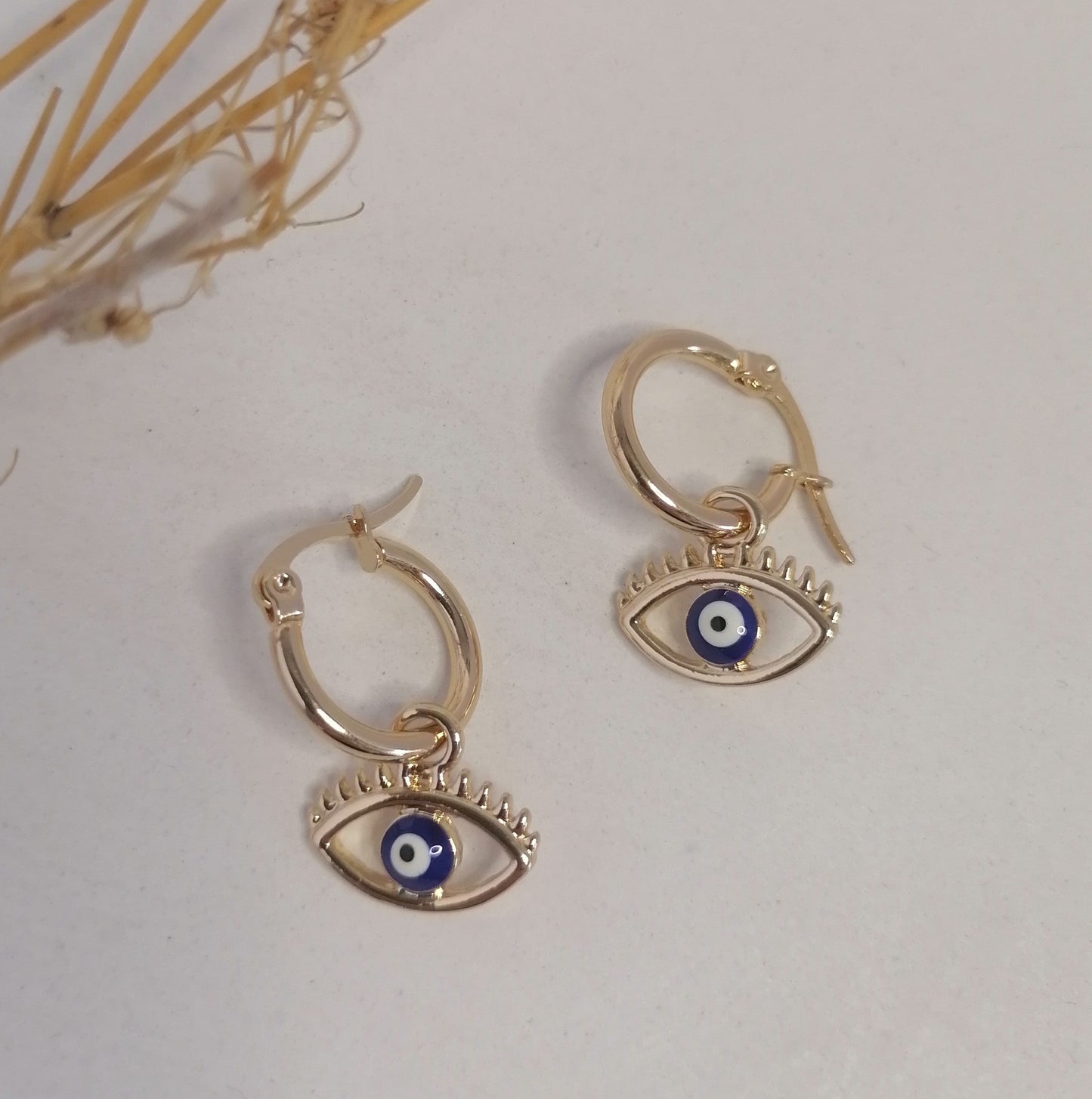 AD025 | Aros acero dorado ojo protector