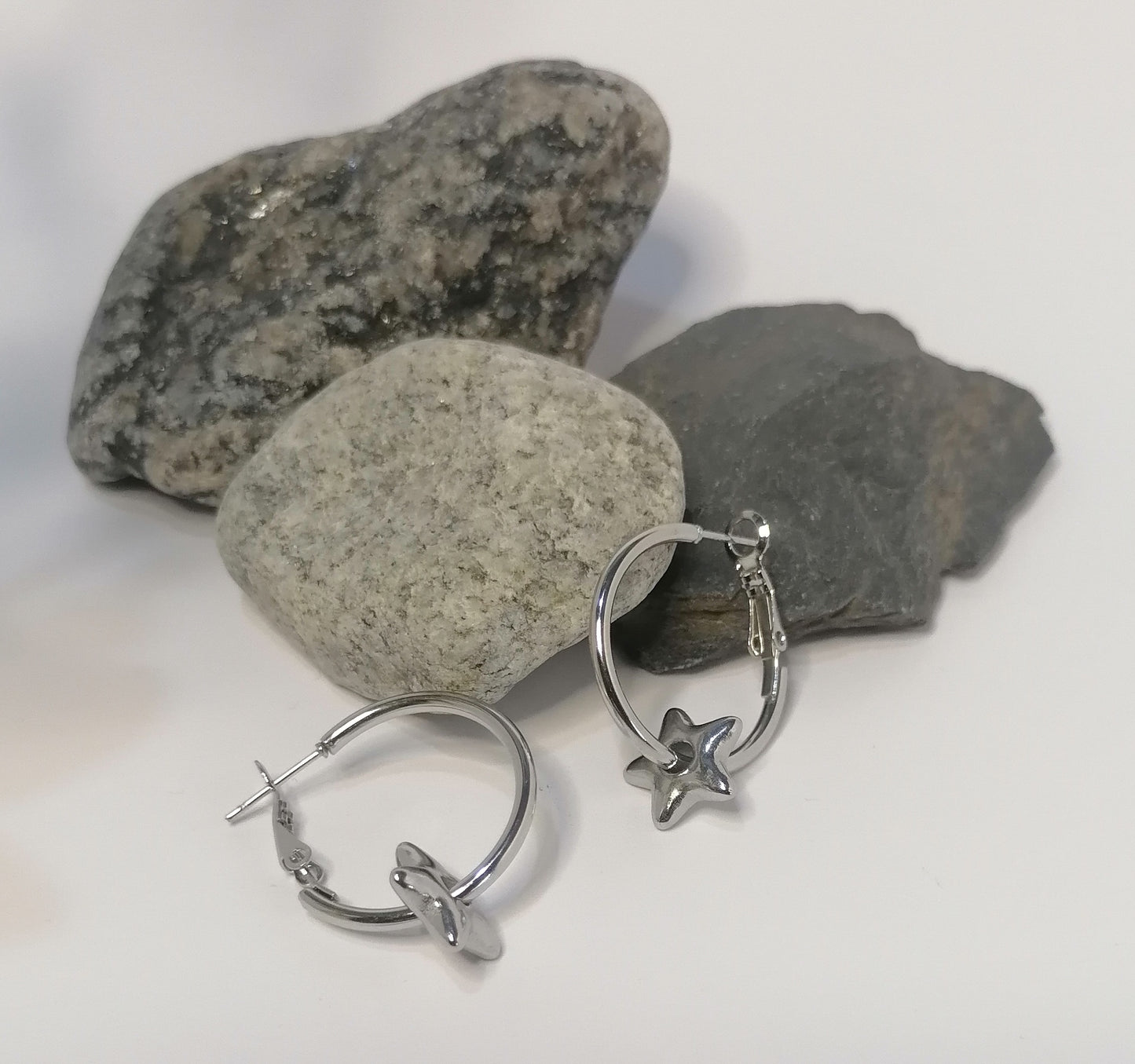 AQ003 | Aros en acero inoxidable con estrella