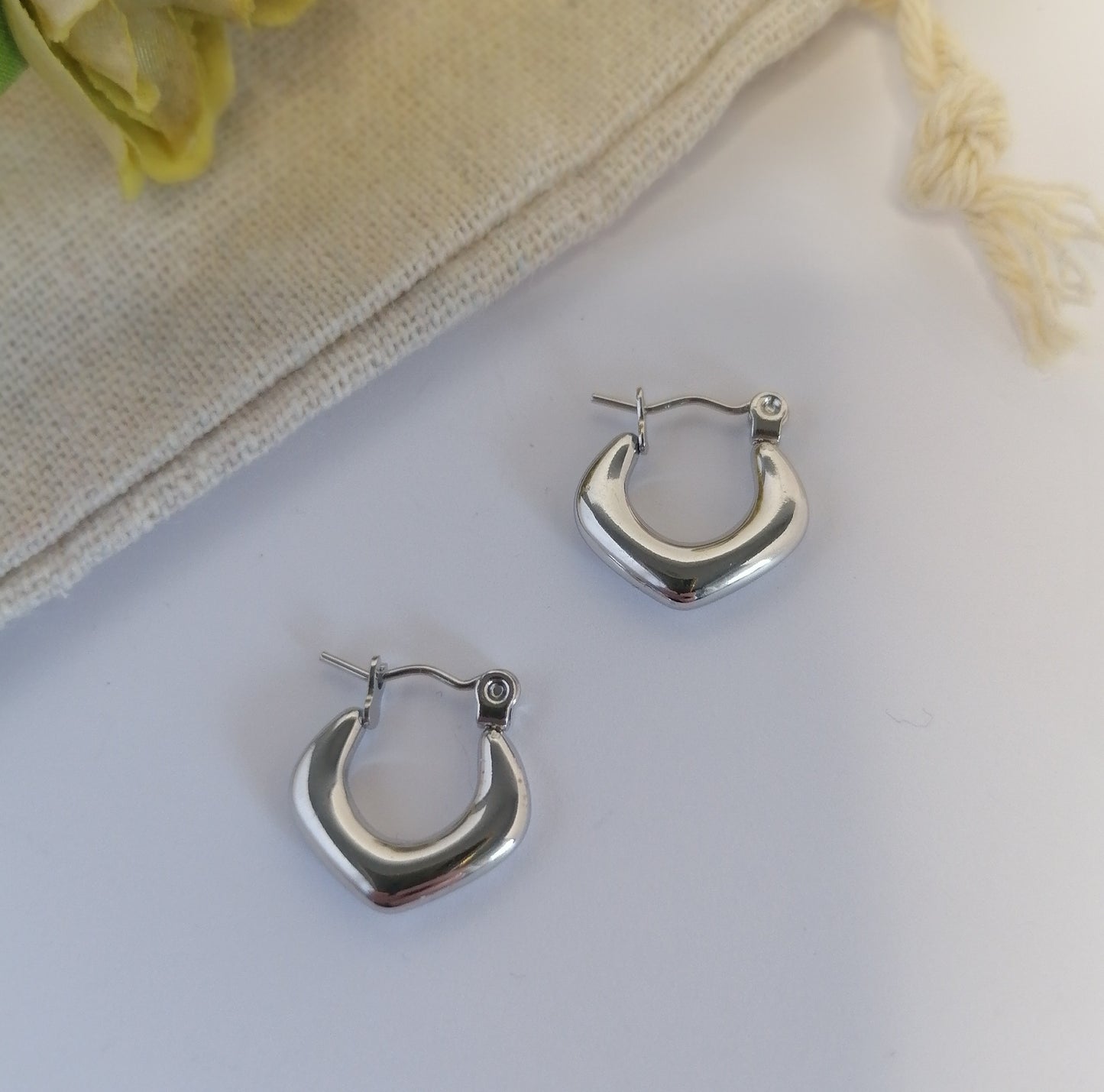 AQ035 | Aros rombo en acero inoxidable