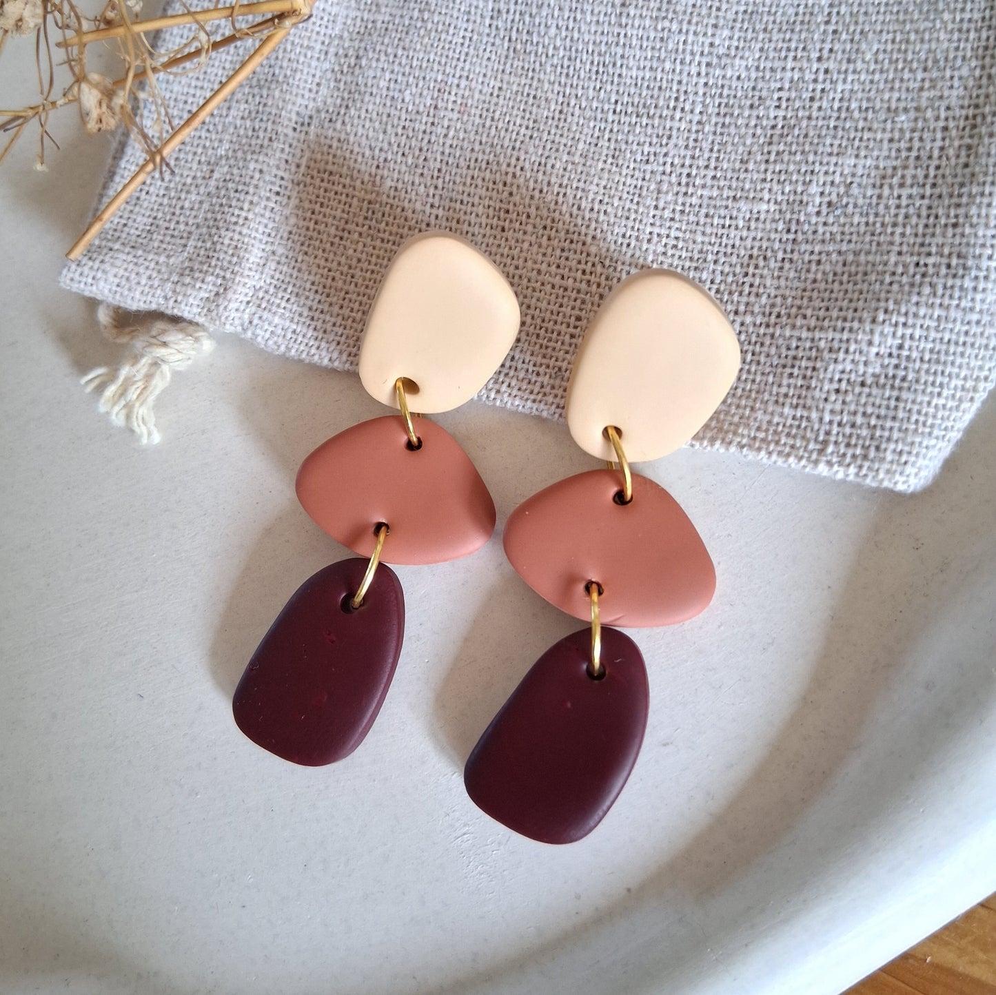 CL002 | Caravanas Antonia - Crudo, terracota y rojo vino