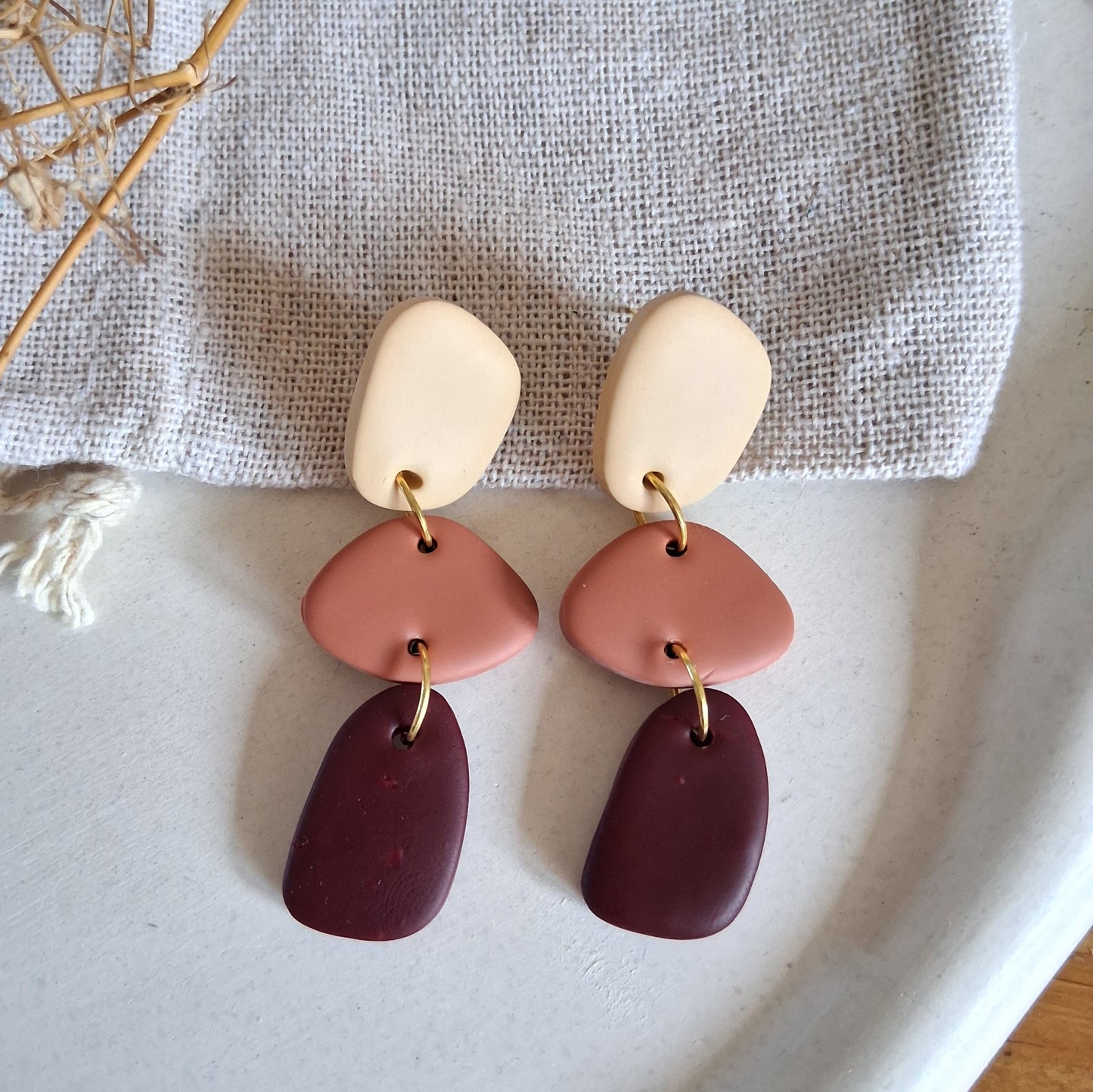 CL002 | Caravanas Antonia - Crudo, terracota y rojo vino