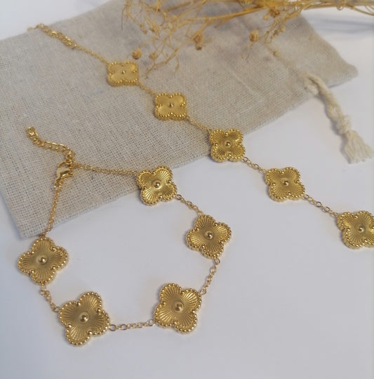 PD005 | Pulsera en acero dorado tréboles de cuatro hojas
