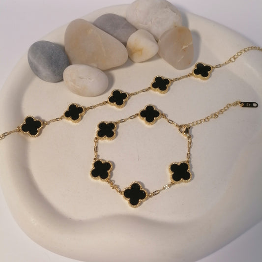 PD011 | Pulsera acero dorado tréboles de cuatro hojas esmaltado negro