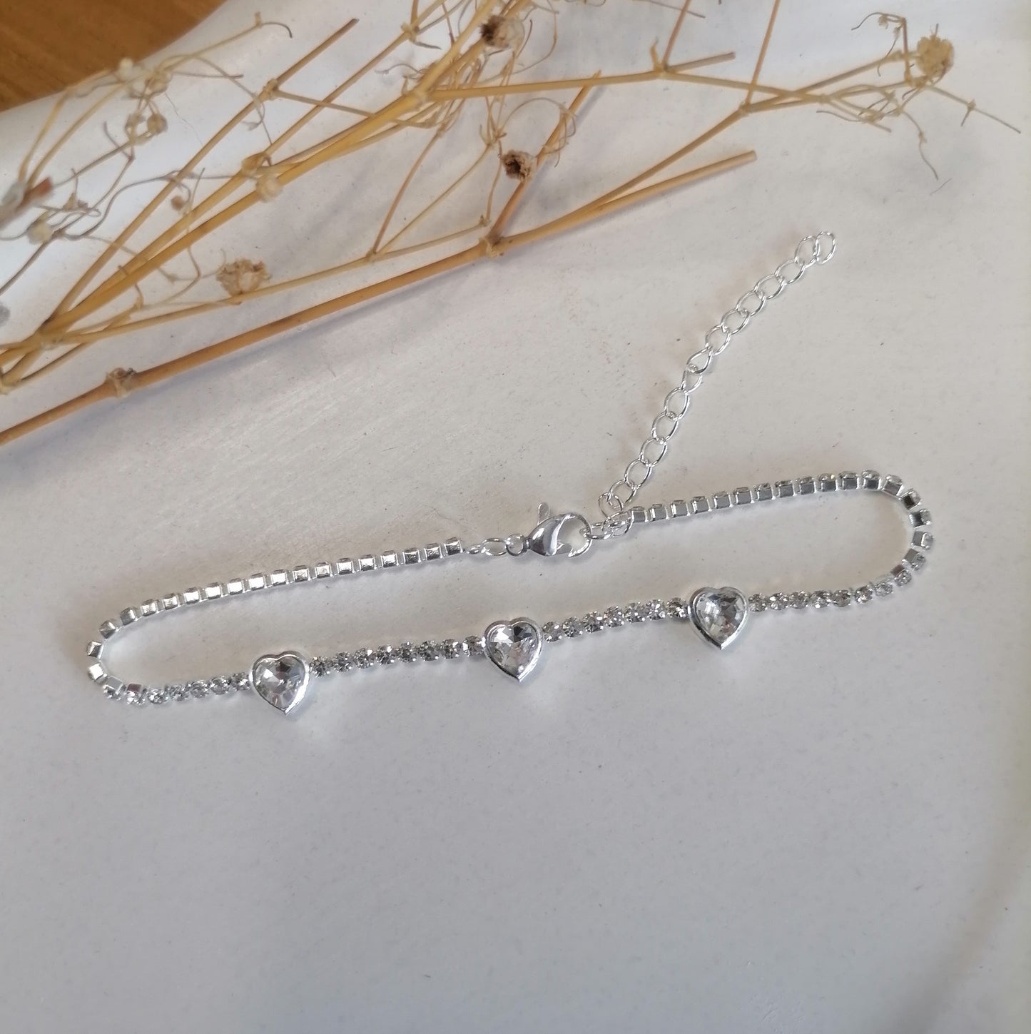 PQ040 | Pulsera en acero blanco tres corazones y circonias