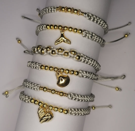 PT005 | Pulsera tejida regulable con separadores en acero dorado