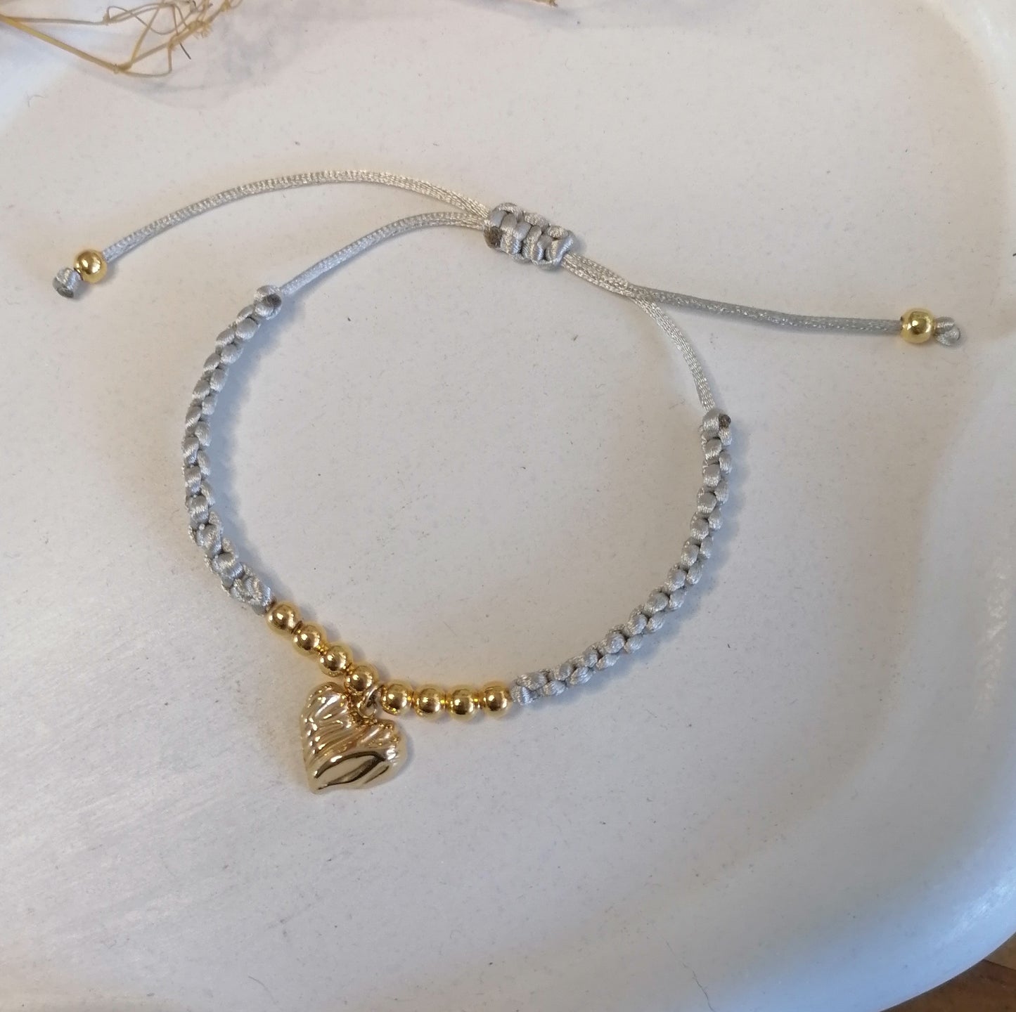 PT005 | Pulsera tejida regulable con separadores en acero dorado