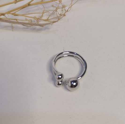 RQ018 | Anillo abierto en acero inoxidable tres esferas