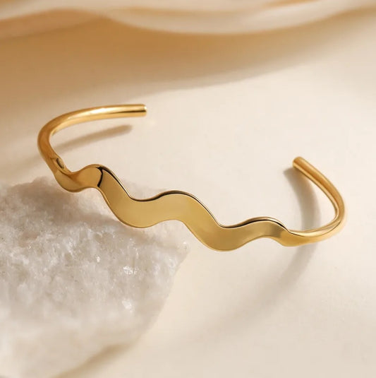 PD024 | Esclava en acero dorado zig zag