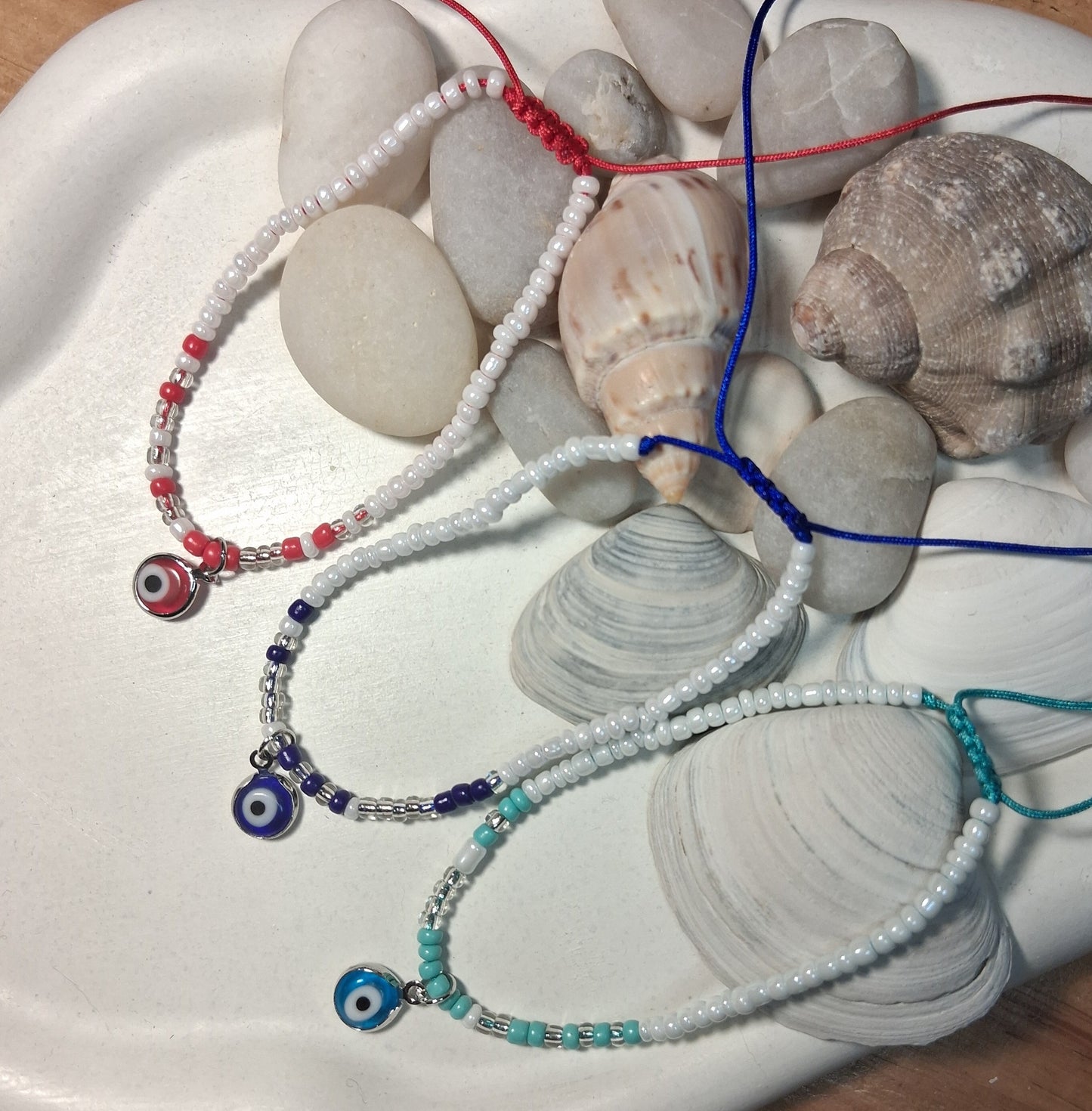 TB002 | Tobillera ajustable ojitos protectores