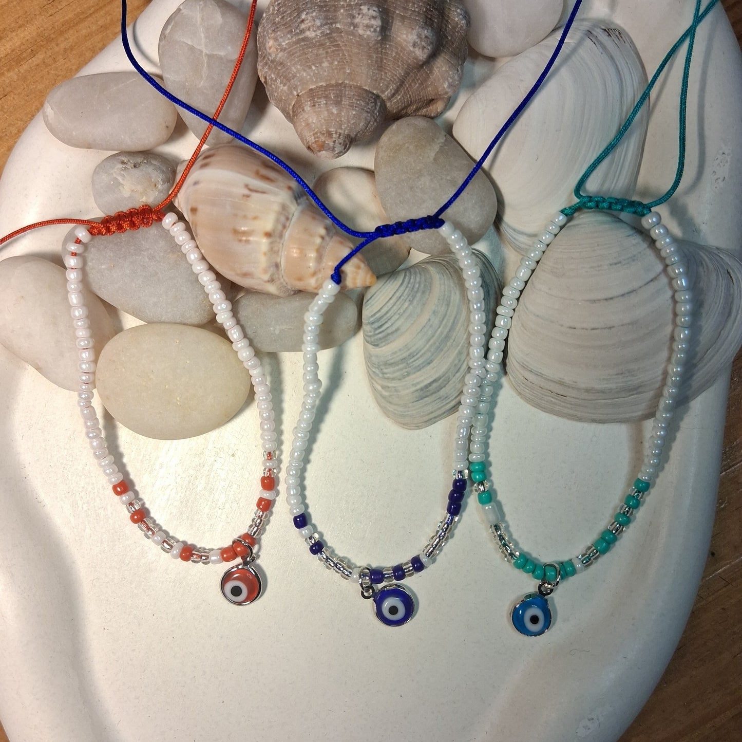 TB002 | Tobillera ajustable ojitos protectores