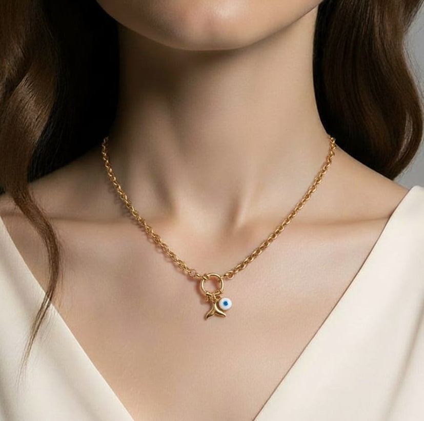 CD032 | Cadena en acero dorado con cierre marinero con dos dijes